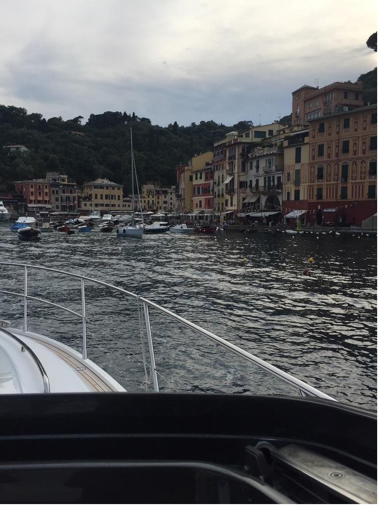 Approaching Portofino harbour from the water aboard a motor yacht